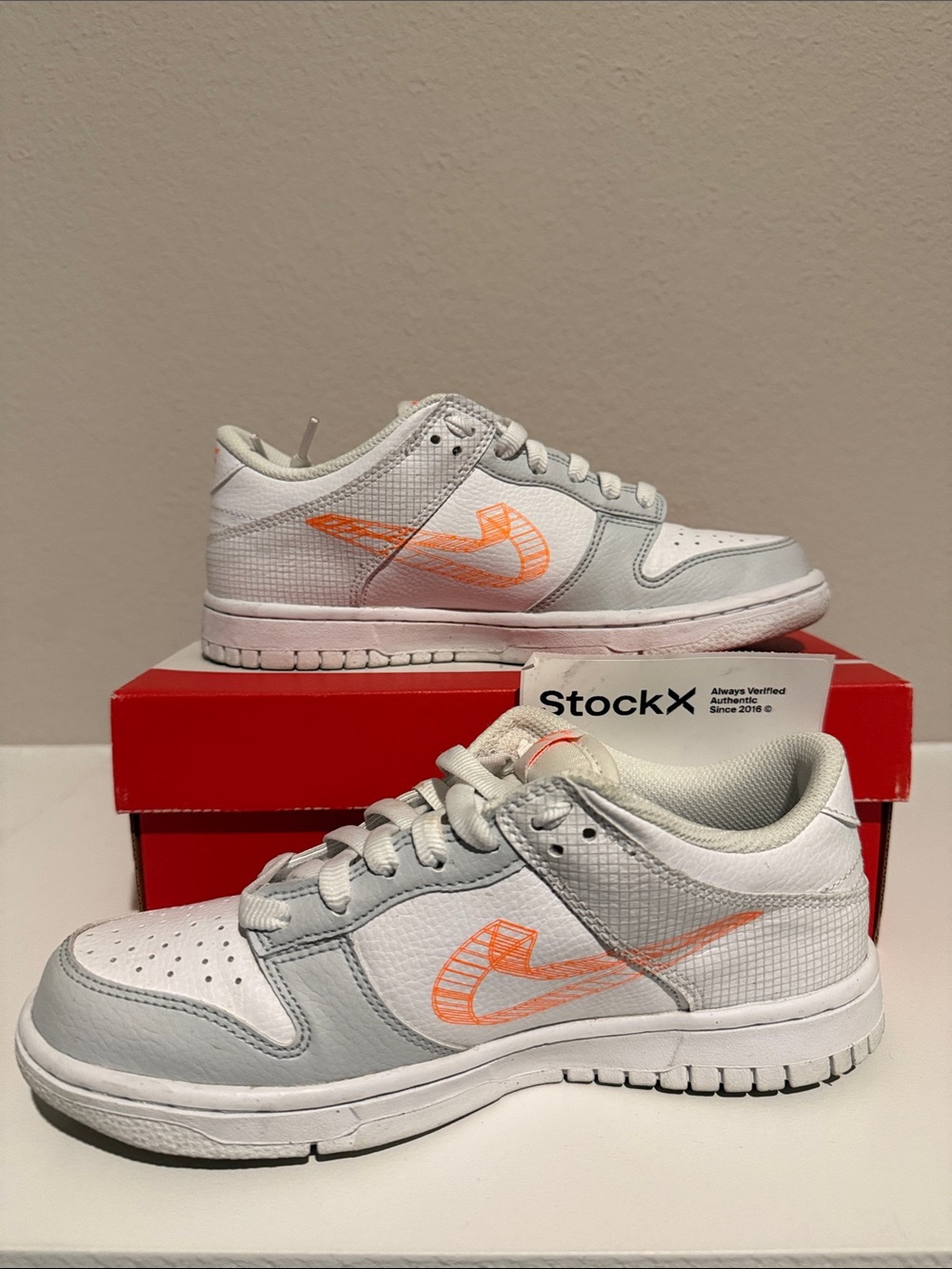 Kids Nike Dunk Low SE GS M - White and Grey Sneakers with Orange Swoosh